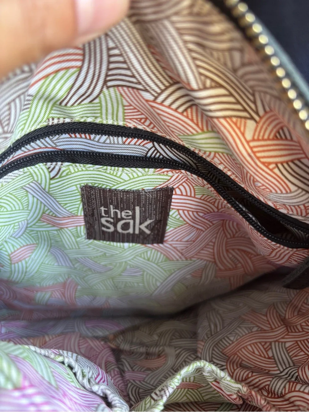 The Sak Black Leather Pebbled Crossbody with Gold Accents